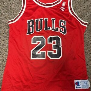 Early 90s size 44 Michael Jordan Champion Bull Jersey NO
CRACKING